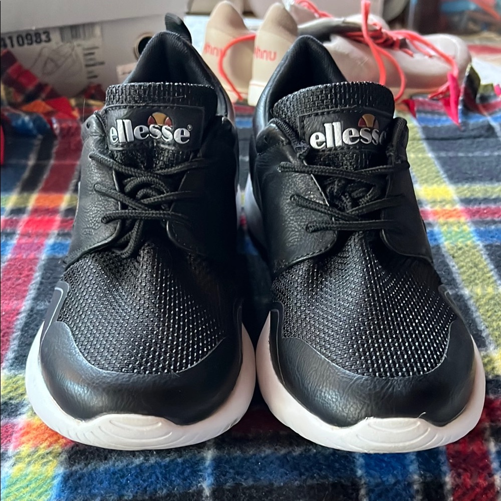 Ellesse Black Sneakers with Breathable Mesh and White Sole
